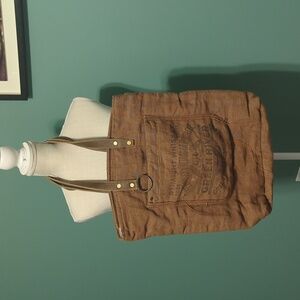 Brown burlap tote with leather straps